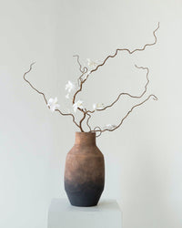 preserved branch sculpture Desert Swan Washi Bloom Riyadh